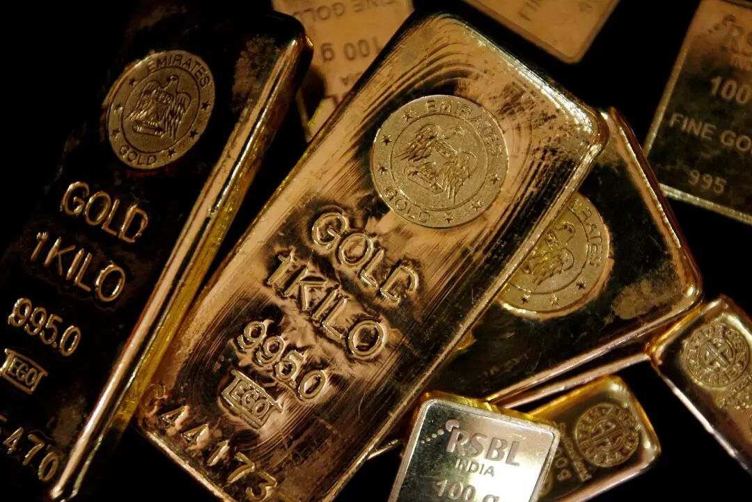 FILE PHOTO: Gold bars are displayed at a gold jewellery shop in the northern Indian city of Chandigarh